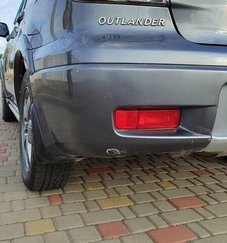 Серый Мицубиси Аутлендер, объемом двигателя 2.38 л и пробегом 189 тыс. км за 7600 $, фото 3 на Automoto.ua