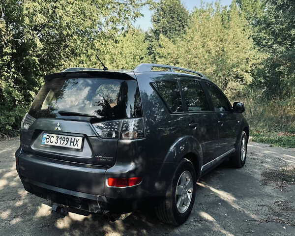 Сірий Міцубісі Аутлендер, об'ємом двигуна 2 л та пробігом 243 тис. км за 8600 $, фото 50 на Automoto.ua