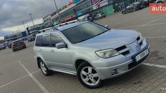 Сірий Міцубісі Аутлендер, об'ємом двигуна 2.4 л та пробігом 170 тис. км за 6400 $, фото 8 на Automoto.ua