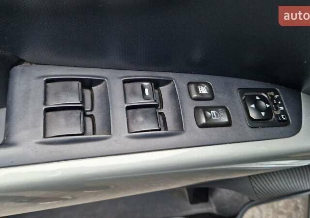 Серый Мицубиси Аутлендер, объемом двигателя 3 л и пробегом 197 тыс. км за 9500 $, фото 9 на Automoto.ua