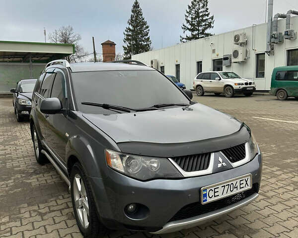 Сірий Міцубісі Аутлендер, об'ємом двигуна 2.36 л та пробігом 380 тис. км за 10000 $, фото 1 на Automoto.ua