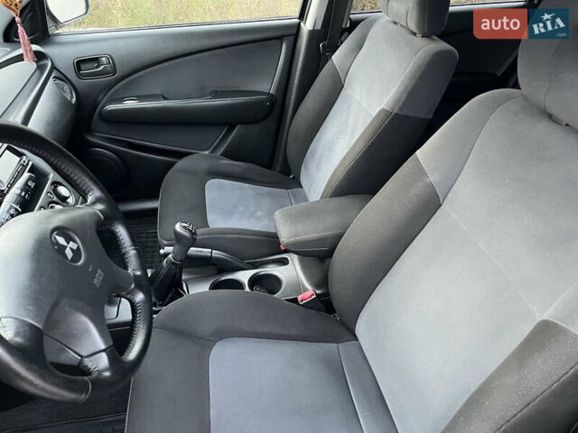Сірий Міцубісі Аутлендер, об'ємом двигуна 2 л та пробігом 192 тис. км за 6400 $, фото 34 на Automoto.ua