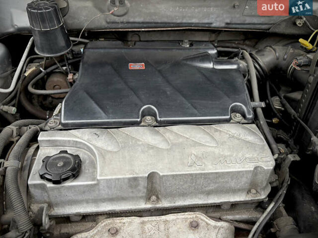 Серый Мицубиси Аутлендер, объемом двигателя 2.38 л и пробегом 238 тыс. км за 7450 $, фото 45 на Automoto.ua