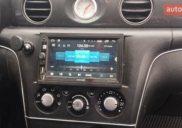 Серый Мицубиси Аутлендер, объемом двигателя 2.38 л и пробегом 204 тыс. км за 6100 $, фото 12 на Automoto.ua