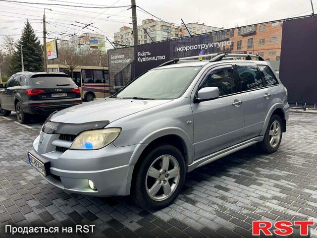 Серый Мицубиси Аутлендер, объемом двигателя 2.4 л и пробегом 280 тыс. км за 5800 $, фото 9 на Automoto.ua