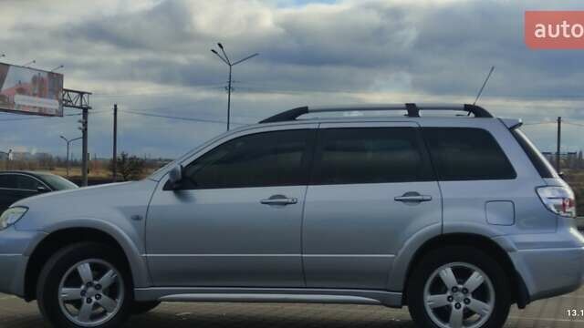 Сірий Міцубісі Аутлендер, об'ємом двигуна 2.4 л та пробігом 170 тис. км за 6400 $, фото 5 на Automoto.ua