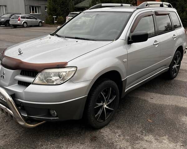 Сірий Міцубісі Аутлендер, об'ємом двигуна 2 л та пробігом 332 тис. км за 6200 $, фото 21 на Automoto.ua