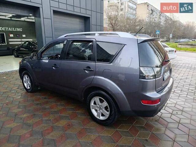 Сірий Міцубісі Аутлендер, об'ємом двигуна 2.36 л та пробігом 214 тис. км за 8500 $, фото 11 на Automoto.ua
