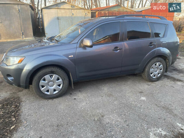 Серый Мицубиси Аутлендер, объемом двигателя 1.97 л и пробегом 257 тыс. км за 9000 $, фото 7 на Automoto.ua