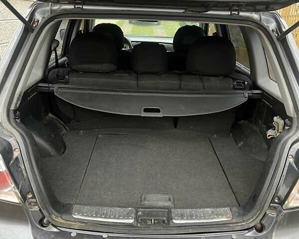 Серый Мицубиси Аутлендер, объемом двигателя 2 л и пробегом 380 тыс. км за 3700 $, фото 4 на Automoto.ua