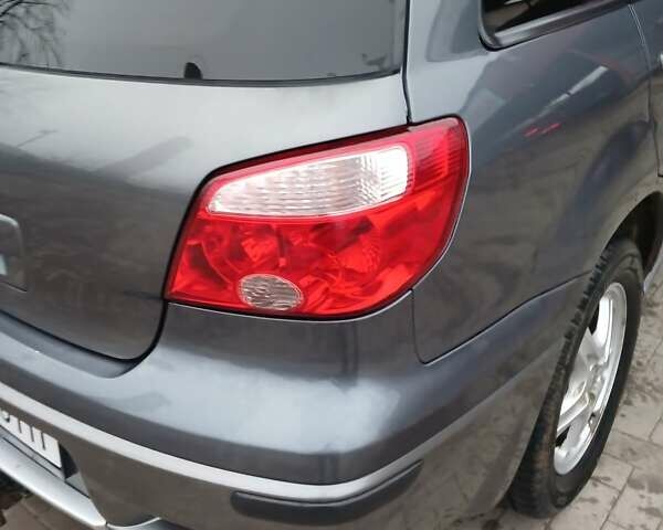 Сірий Міцубісі Аутлендер, об'ємом двигуна 2 л та пробігом 191 тис. км за 6500 $, фото 1 на Automoto.ua