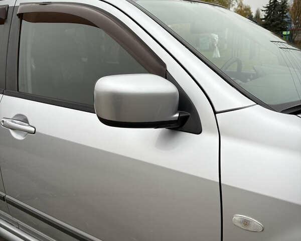 Серый Мицубиси Аутлендер, объемом двигателя 2.38 л и пробегом 238 тыс. км за 7450 $, фото 16 на Automoto.ua