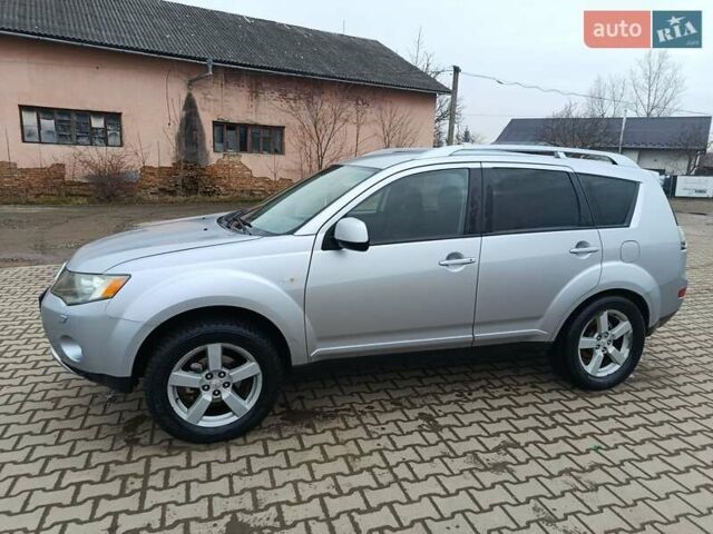 Серый Мицубиси Аутлендер, объемом двигателя 2 л и пробегом 332 тыс. км за 7650 $, фото 3 на Automoto.ua