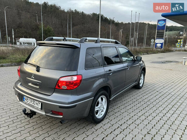 Серый Мицубиси Аутлендер, объемом двигателя 2 л и пробегом 196 тыс. км за 6450 $, фото 13 на Automoto.ua