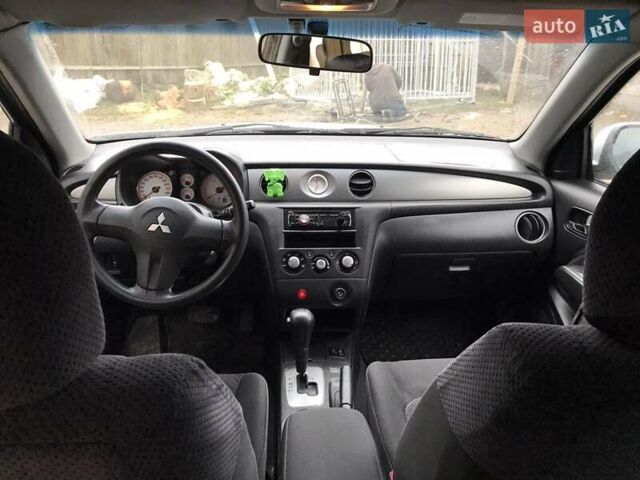 Сірий Міцубісі Аутлендер, об'ємом двигуна 2.4 л та пробігом 167 тис. км за 6400 $, фото 17 на Automoto.ua