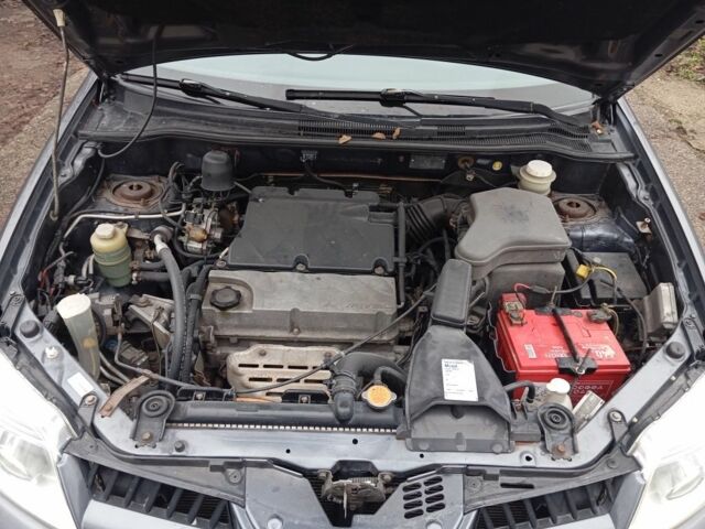 Сірий Міцубісі Аутлендер, об'ємом двигуна 0 л та пробігом 210 тис. км за 5650 $, фото 5 на Automoto.ua