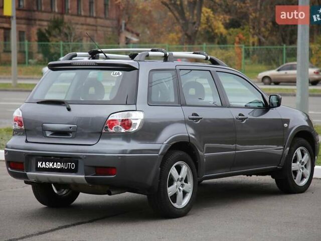 Серый Мицубиси Аутлендер, объемом двигателя 0 л и пробегом 240 тыс. км за 7200 $, фото 5 на Automoto.ua