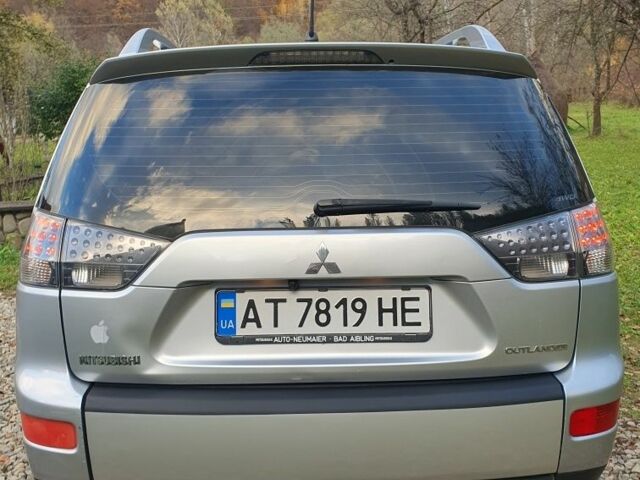 Серый Мицубиси Аутлендер, объемом двигателя 2 л и пробегом 320 тыс. км за 7500 $, фото 9 на Automoto.ua