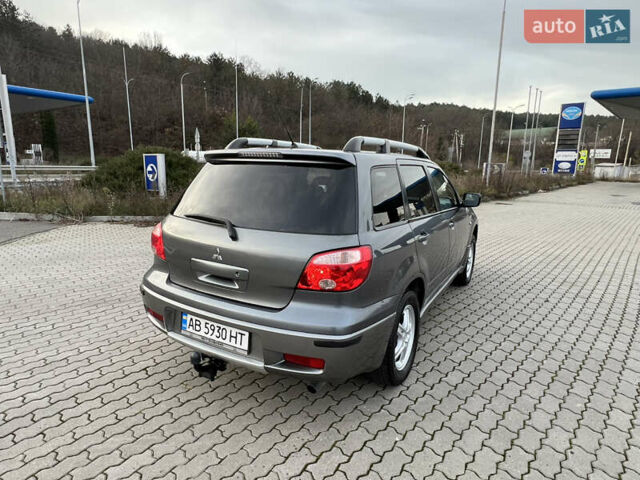 Сірий Міцубісі Аутлендер, об'ємом двигуна 2 л та пробігом 192 тис. км за 6400 $, фото 3 на Automoto.ua