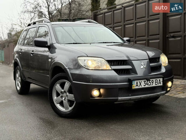 Серый Мицубиси Аутлендер, объемом двигателя 2.4 л и пробегом 240 тыс. км за 6900 $, фото 37 на Automoto.ua