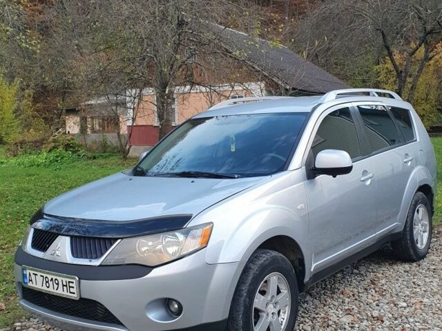 Серый Мицубиси Аутлендер, объемом двигателя 2 л и пробегом 320 тыс. км за 7500 $, фото 13 на Automoto.ua