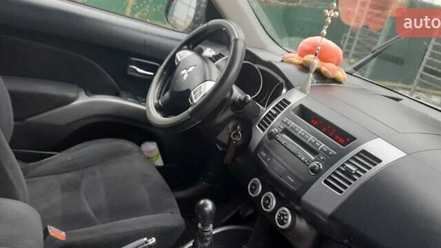 Сірий Міцубісі Аутлендер, об'ємом двигуна 1.97 л та пробігом 197 тис. км за 8999 $, фото 13 на Automoto.ua