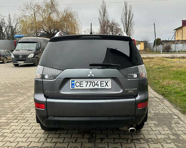 Сірий Міцубісі Аутлендер, об'ємом двигуна 2.36 л та пробігом 380 тис. км за 10000 $, фото 5 на Automoto.ua