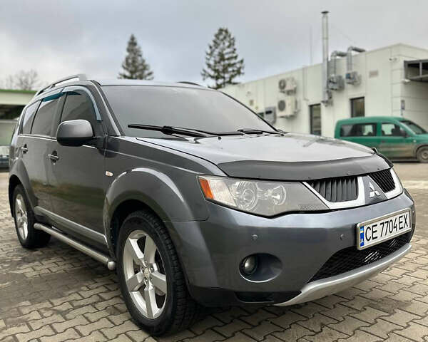 Сірий Міцубісі Аутлендер, об'ємом двигуна 2.36 л та пробігом 380 тис. км за 10000 $, фото 14 на Automoto.ua