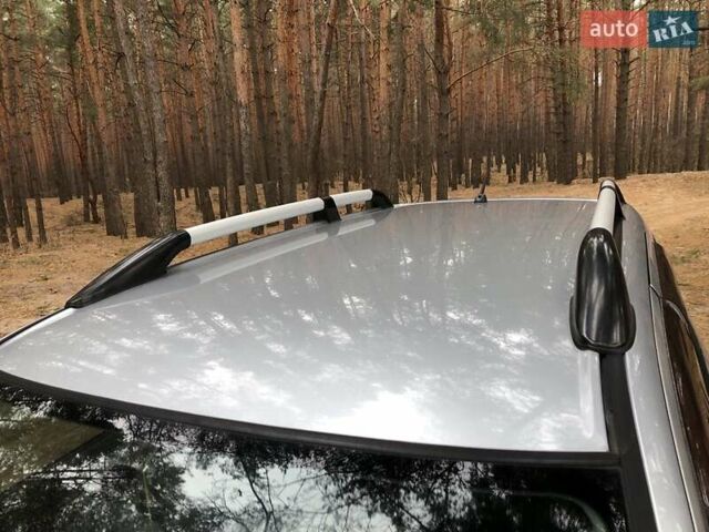 Сірий Міцубісі Аутлендер, об'ємом двигуна 2.38 л та пробігом 230 тис. км за 8000 $, фото 4 на Automoto.ua