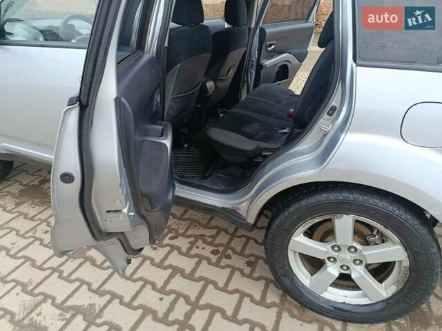 Серый Мицубиси Аутлендер, объемом двигателя 2 л и пробегом 332 тыс. км за 7650 $, фото 22 на Automoto.ua