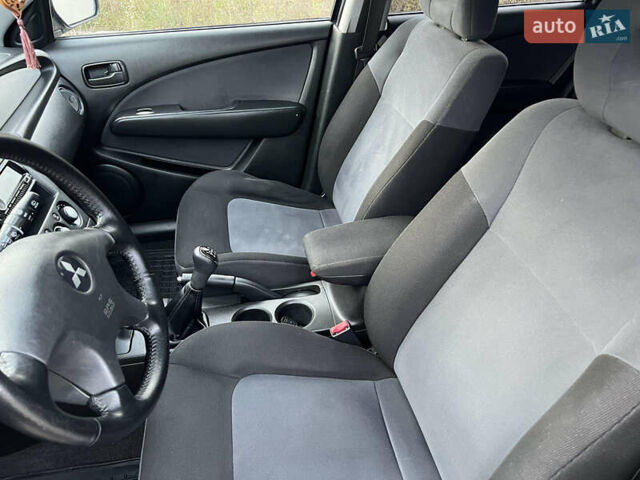 Серый Мицубиси Аутлендер, объемом двигателя 2 л и пробегом 196 тыс. км за 6450 $, фото 27 на Automoto.ua