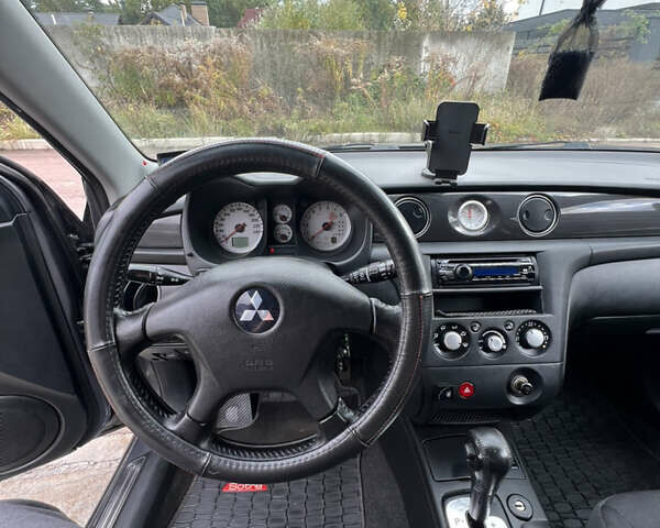 Мицубиси Аутлендер 2007 в Киеве на Automoto.ua Серый Мицубиси Аутлендер, объемом двигателя 2.4 л и пробегом 291 тыс. км за 6500 $, фото 25 на Automoto.ua