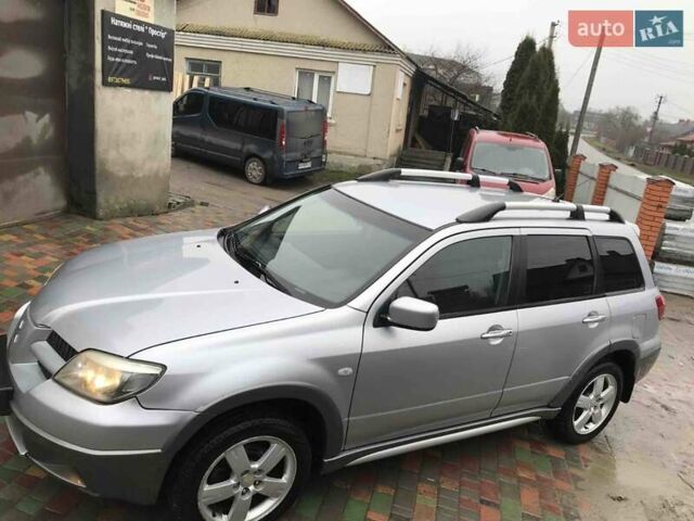 Сірий Міцубісі Аутлендер, об'ємом двигуна 2.4 л та пробігом 167 тис. км за 6400 $, фото 2 на Automoto.ua