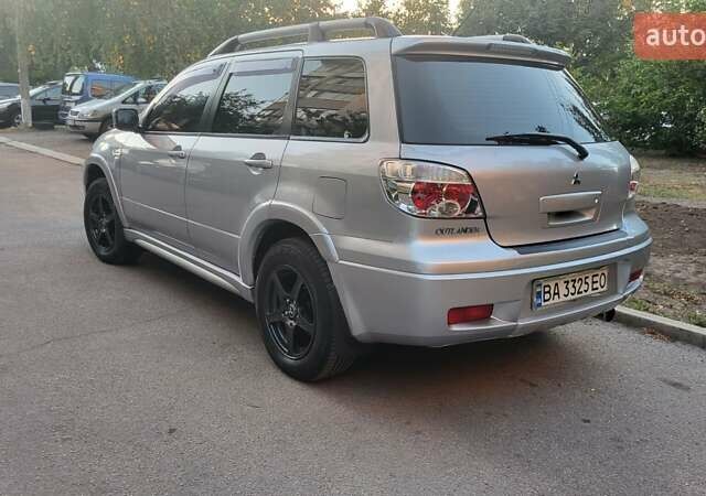 Сірий Міцубісі Аутлендер, об'ємом двигуна 2.4 л та пробігом 260 тис. км за 7300 $, фото 7 на Automoto.ua