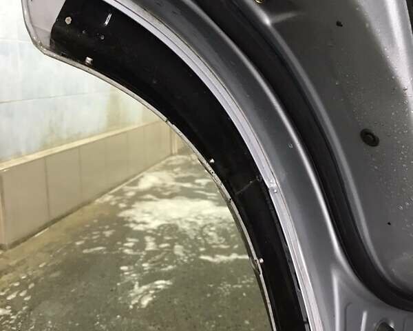 Сірий Міцубісі Аутлендер, об'ємом двигуна 2.4 л та пробігом 167 тис. км за 6400 $, фото 12 на Automoto.ua