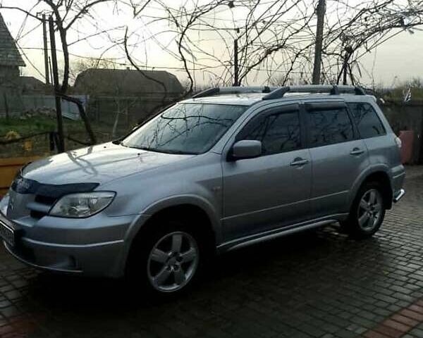 Сірий Міцубісі Аутлендер, об'ємом двигуна 2 л та пробігом 268 тис. км за 7500 $, фото 1 на Automoto.ua