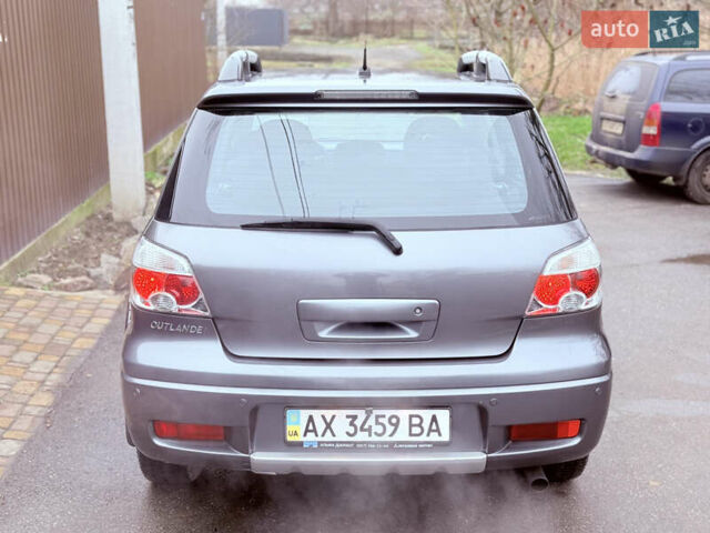 Серый Мицубиси Аутлендер, объемом двигателя 2.4 л и пробегом 240 тыс. км за 6900 $, фото 56 на Automoto.ua