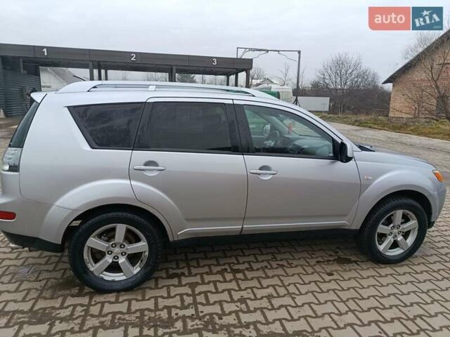 Серый Мицубиси Аутлендер, объемом двигателя 2 л и пробегом 332 тыс. км за 7650 $, фото 34 на Automoto.ua
