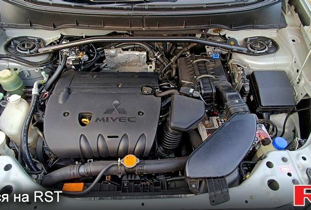 Сірий Міцубісі Аутлендер, об'ємом двигуна 2.4 л та пробігом 162 тис. км за 10000 $, фото 5 на Automoto.ua
