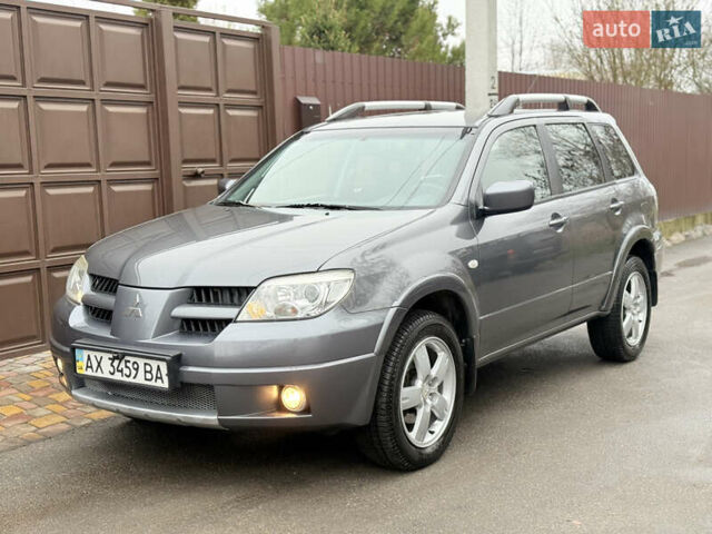 Серый Мицубиси Аутлендер, объемом двигателя 2.4 л и пробегом 240 тыс. км за 6900 $, фото 6 на Automoto.ua
