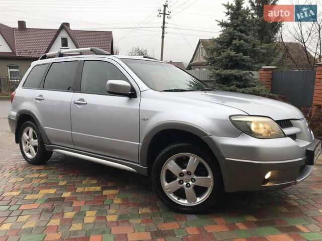 Сірий Міцубісі Аутлендер, об'ємом двигуна 2.4 л та пробігом 167 тис. км за 6400 $, фото 5 на Automoto.ua