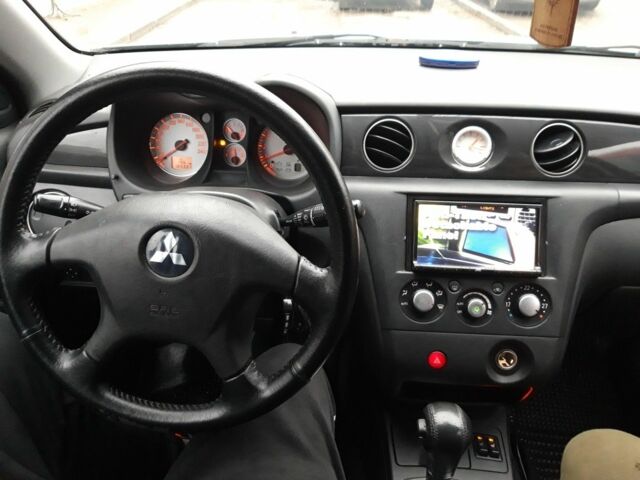 Сірий Міцубісі Аутлендер, об'ємом двигуна 2.4 л та пробігом 190 тис. км за 6000 $, фото 7 на Automoto.ua