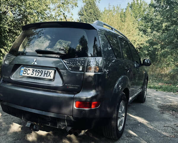 Сірий Міцубісі Аутлендер, об'ємом двигуна 2 л та пробігом 243 тис. км за 8600 $, фото 49 на Automoto.ua