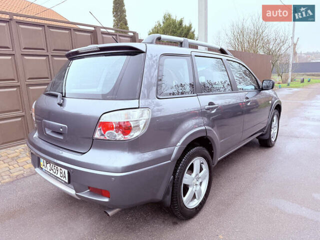 Серый Мицубиси Аутлендер, объемом двигателя 2.4 л и пробегом 240 тыс. км за 6900 $, фото 65 на Automoto.ua