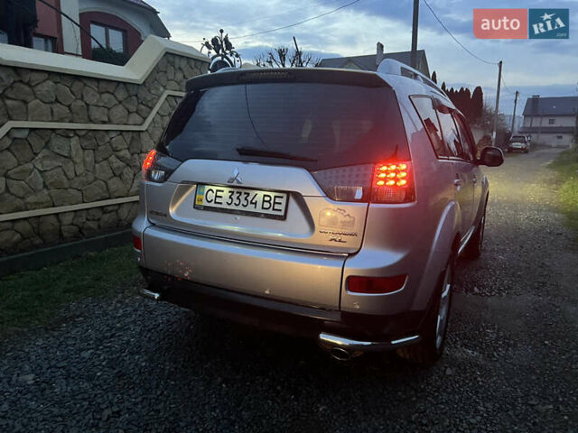 Серый Мицубиси Аутлендер, объемом двигателя 2.4 л и пробегом 236 тыс. км за 7600 $, фото 50 на Automoto.ua