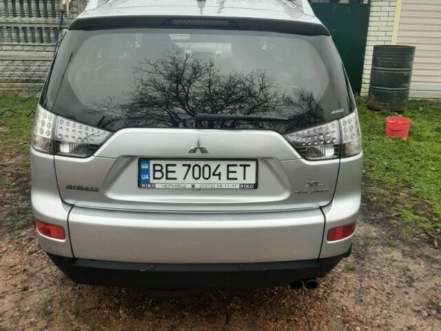 Серый Мицубиси Аутлендер, объемом двигателя 3 л и пробегом 183 тыс. км за 9200 $, фото 2 на Automoto.ua