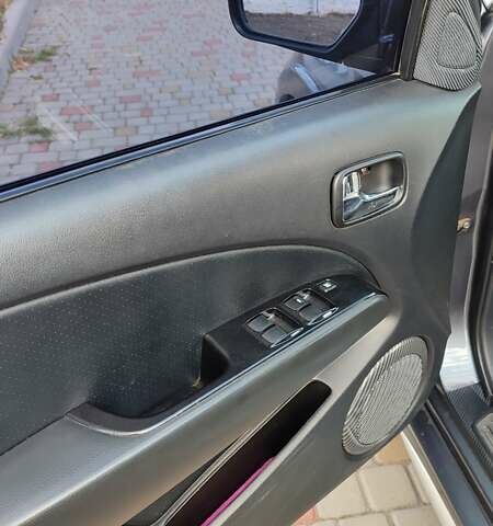 Серый Мицубиси Аутлендер, объемом двигателя 2.38 л и пробегом 189 тыс. км за 7600 $, фото 9 на Automoto.ua