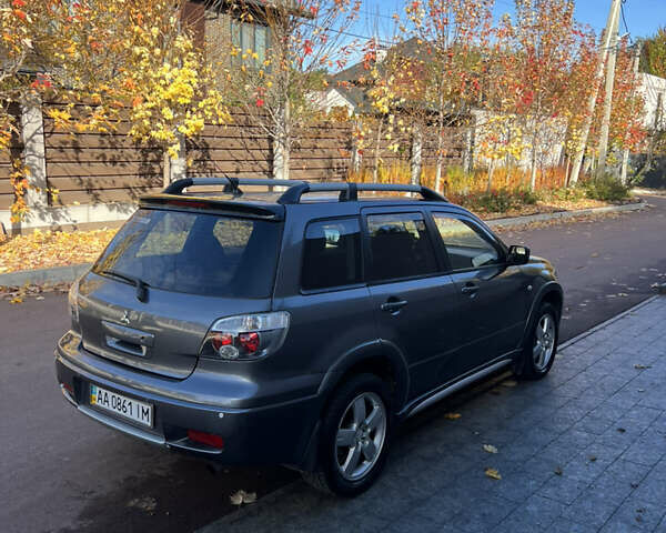 Мицубиси Аутлендер 2007 в Киеве на Automoto.ua Серый Мицубиси Аутлендер, объемом двигателя 2.4 л и пробегом 291 тыс. км за 6500 $, фото 6 на Automoto.ua