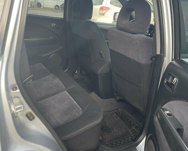 Сірий Міцубісі Аутлендер, об'ємом двигуна 2.4 л та пробігом 166 тис. км за 6700 $, фото 7 на Automoto.ua