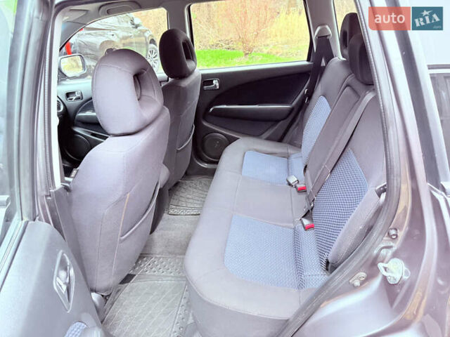 Серый Мицубиси Аутлендер, объемом двигателя 2.4 л и пробегом 240 тыс. км за 6900 $, фото 63 на Automoto.ua